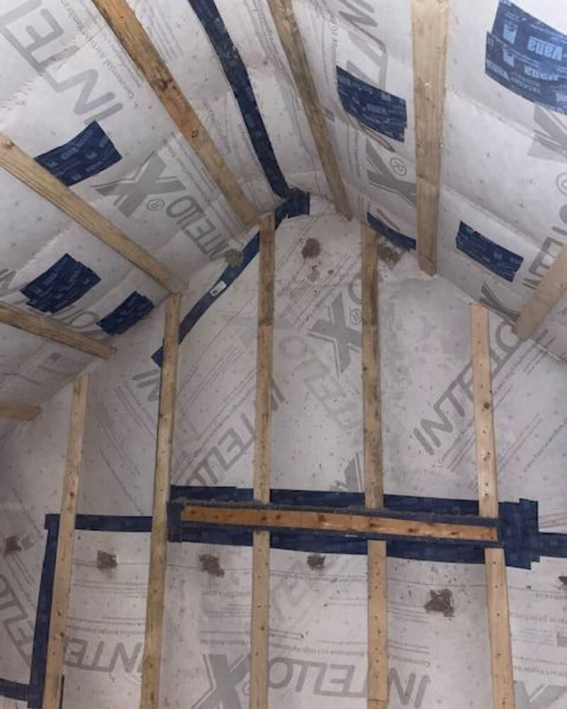 A roof with insulation and insulation boards, providing energy efficiency and temperature control.